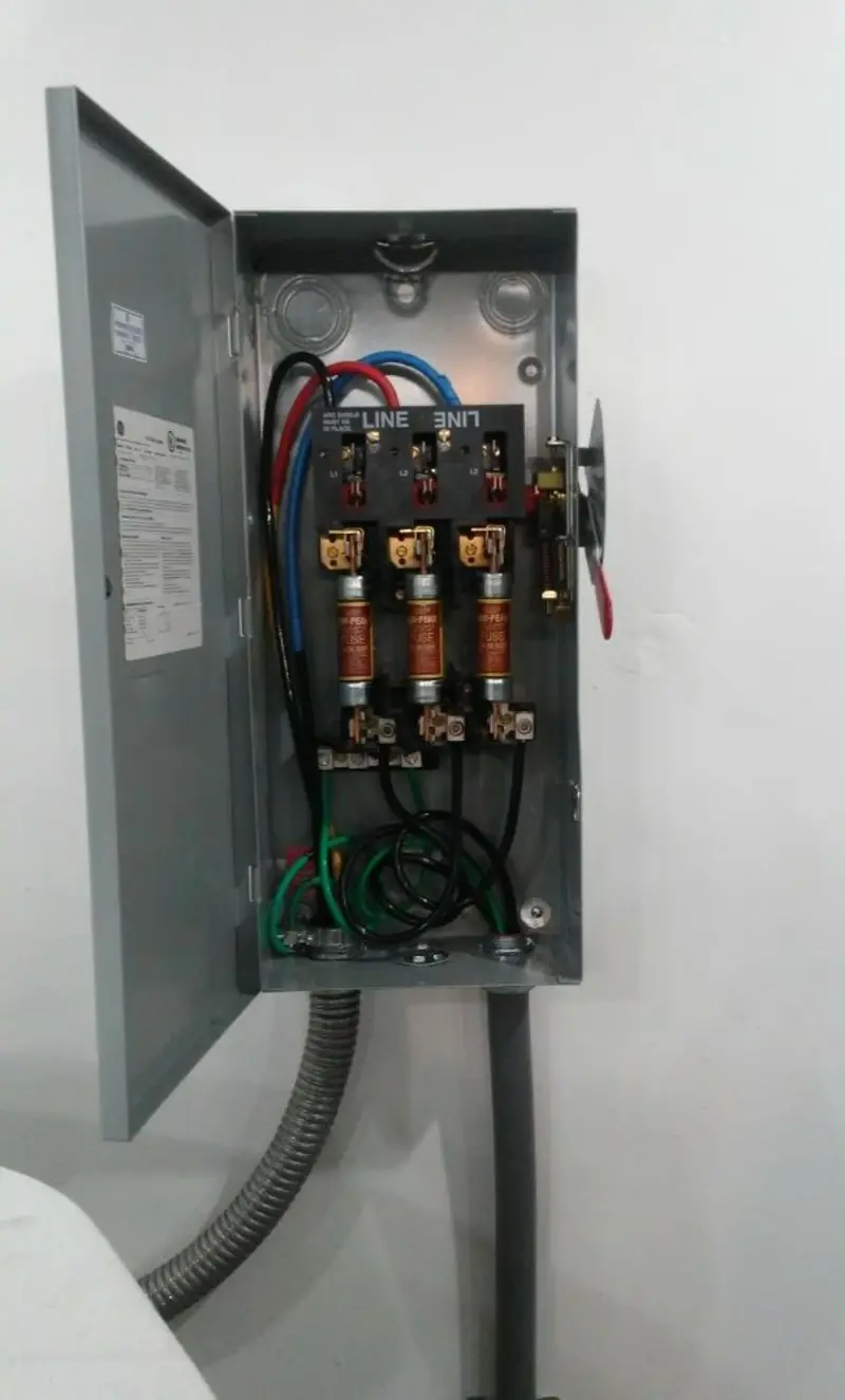 Three-phase disconnect switch installed for Smoke Detector Installation in Holton