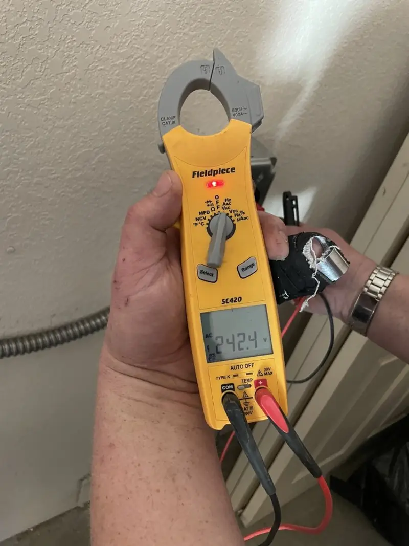 Voltage testing with clamp meter during Aluminum Wiring Replacement in Holton